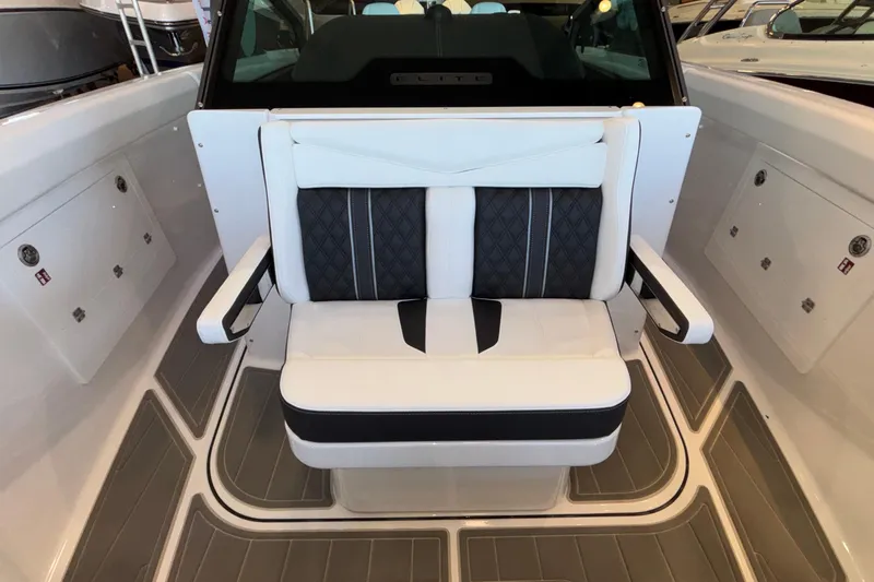  Yacht Photos Pics Luxury seating on 2026 Monterey Elite 30 OB boat, featuring elegant design and premium materials.