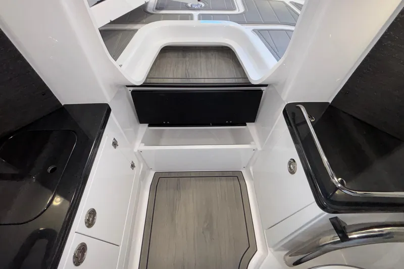  Yacht Photos Pics 2026 Monterey Elite 30 OB interior with sleek cabinetry and modern design.
