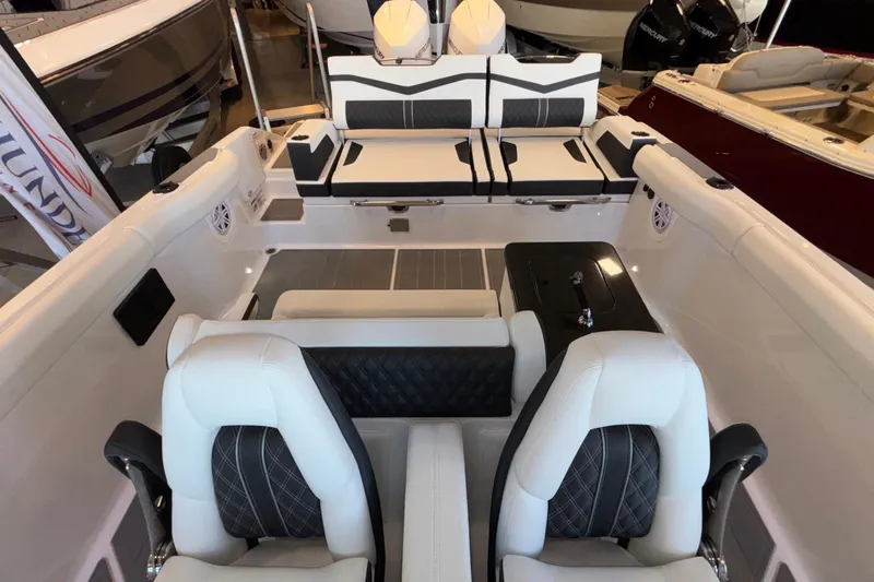  Yacht Photos Pics Luxurious interior of 2026 Monterey Elite 30 OB boat with stylish seating and modern design.