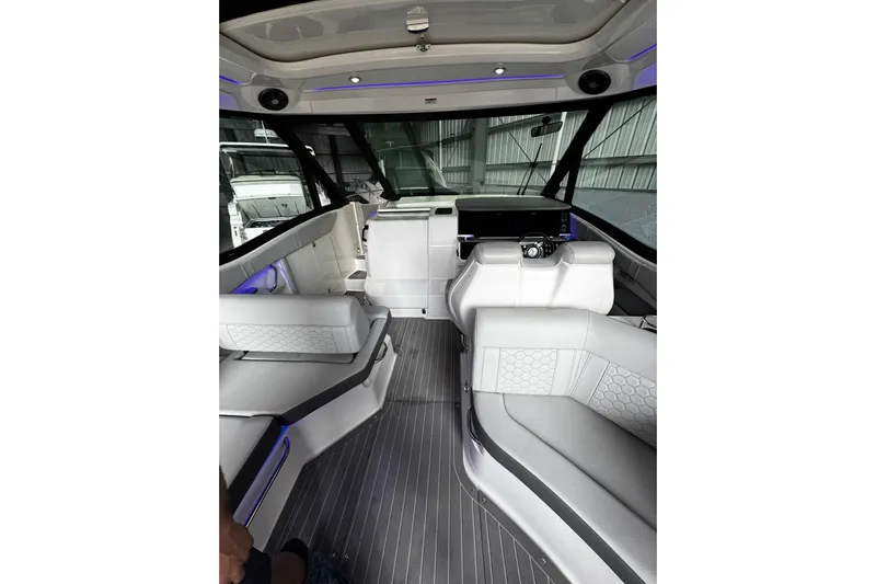  Yacht Photos Pics 2022 Sea Ray Sundancer 320 Outboard interior with modern seating and sleek design.