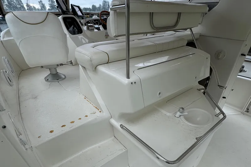  Yacht Photos Pics 2000 Sea Ray 380 Aft Cabin interior with seating and sink area.