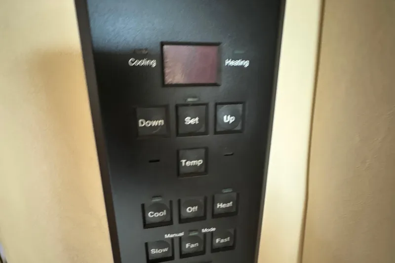  Yacht Photos Pics Control panel of a 2000 Sea Ray 380 Aft Cabin boat, featuring temperature settings.