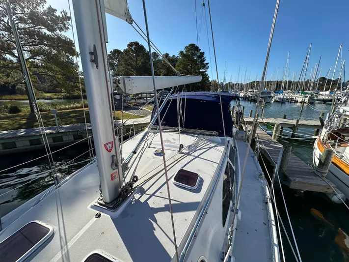 Chesapeake Free Yacht Photos Pics Sailboat Catalina 387, 2006 model, docked at marina with clear blue sky.