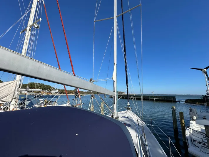 Chesapeake Free Yacht Photos Pics Sailboat Catalina 387, 2006 model, docked at marina with clear blue sky.