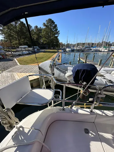 Chesapeake Free Yacht Photos Pics 2006 Catalina 387 sailboat docked at marina with clear sky and trees in background.