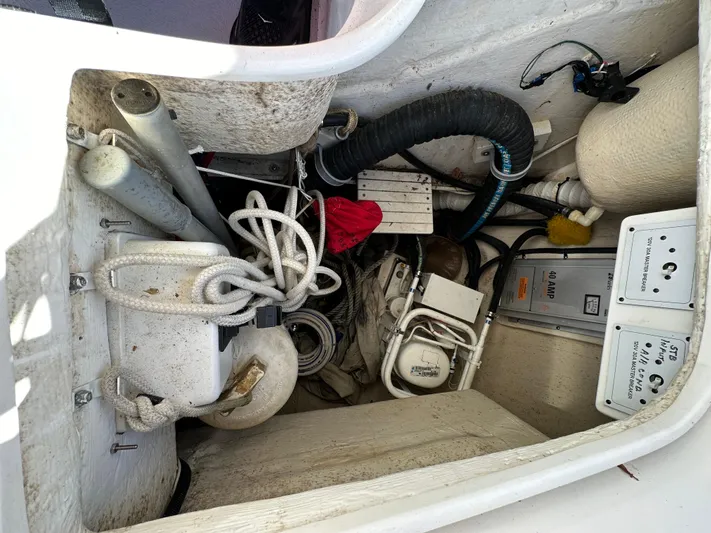 Chesapeake Free Yacht Photos Pics Storage compartment of a 2006 Catalina 387 sailboat with ropes and equipment.