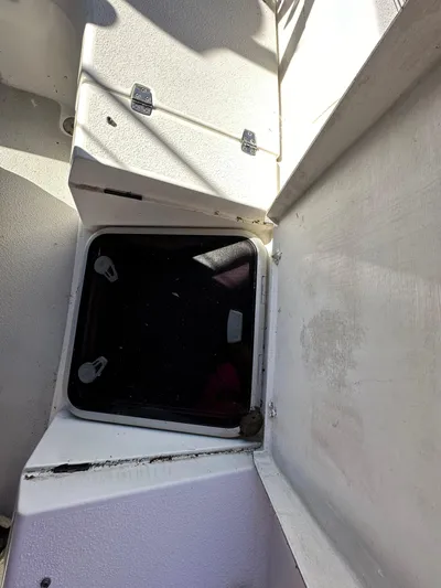 Chesapeake Free Yacht Photos Pics Open hatch on 2006 Catalina 387 sailboat deck, showing interior access.