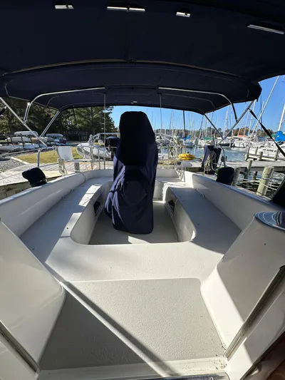 Chesapeake Free Yacht Photos Pics 2006 Catalina 387 sailboat cockpit with covered helm, docked at marina.