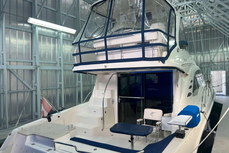 Elisabeth Jane Yacht Photos Pics 2008 Sea Ray 52 Sedan Bridge yacht in a metal storage facility.