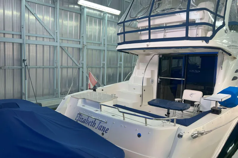 Elisabeth Jane Yacht Photos Pics 2008 Sea Ray 52 Sedan Bridge yacht in a storage facility, rear view.