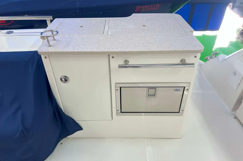 Elisabeth Jane Yacht Photos Pics 2008 Sea Ray 52 Sedan Bridge yacht kitchenette with countertop and storage.