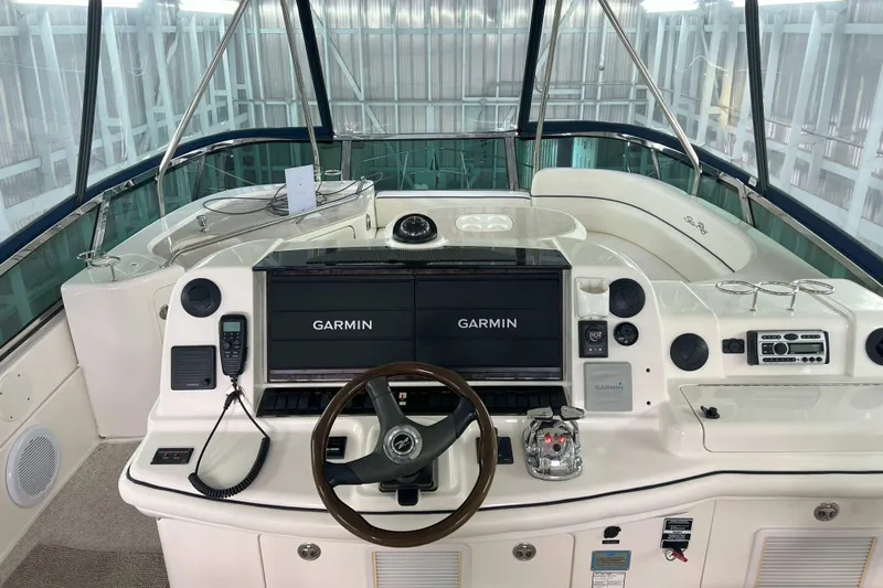 Elisabeth Jane Yacht Photos Pics 2008 Sea Ray 52 Sedan Bridge helm with Garmin navigation system and luxurious seating.