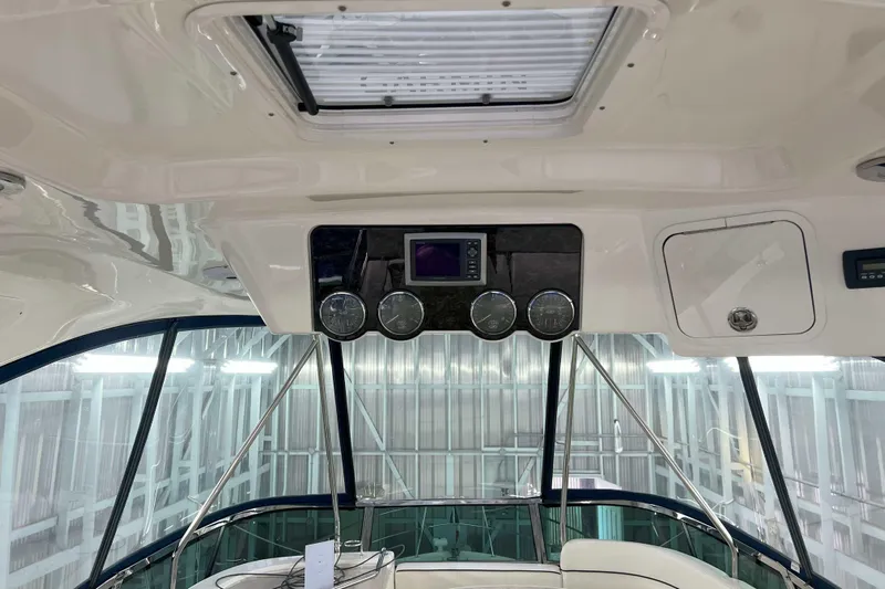 Elisabeth Jane Yacht Photos Pics Interior view of 2008 Sea Ray 52 Sedan Bridge helm with gauges and controls.