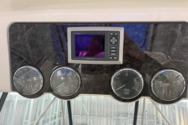 Elisabeth Jane Yacht Photos Pics Dashboard of 2008 Sea Ray 52 Sedan Bridge with gauges and VesselView display.