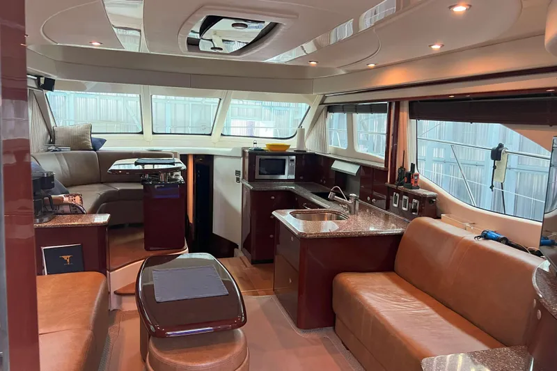 Elisabeth Jane Yacht Photos Pics Luxurious interior of 2008 Sea Ray 52 Sedan Bridge yacht with modern amenities.