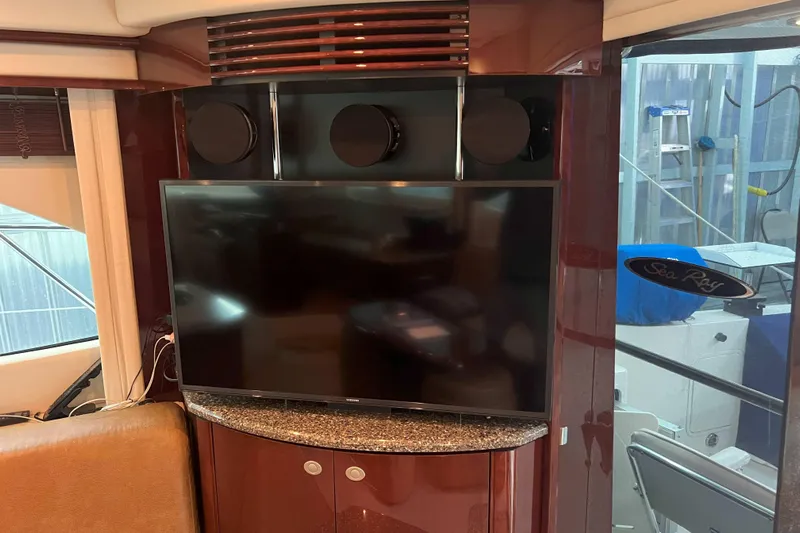 Elisabeth Jane Yacht Photos Pics Interior of 2008 Sea Ray 52 Sedan Bridge with TV and sound system.