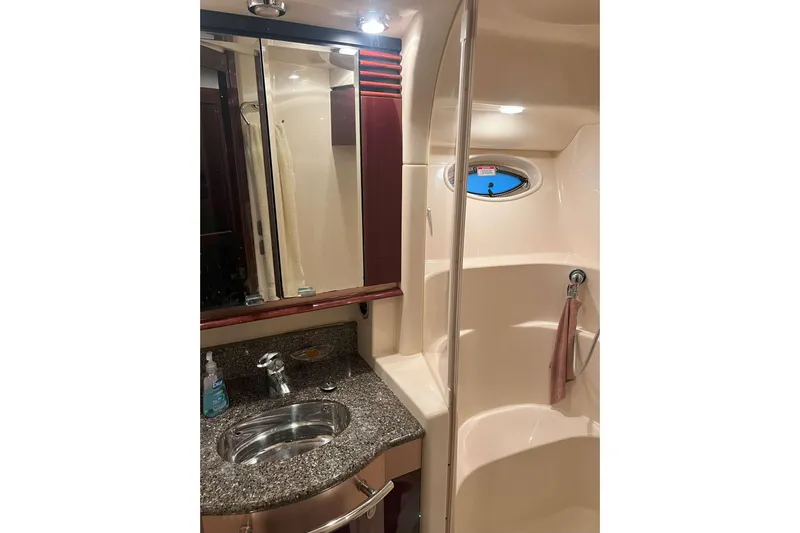 Elisabeth Jane Yacht Photos Pics Luxurious bathroom in 2008 Sea Ray 52 Sedan Bridge yacht with granite countertop and shower.