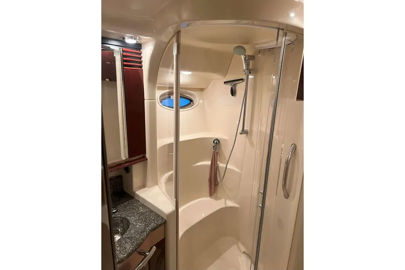 Elisabeth Jane Yacht Photos Pics Luxurious bathroom in 2008 Sea Ray 52 Sedan Bridge yacht with shower and granite countertop.