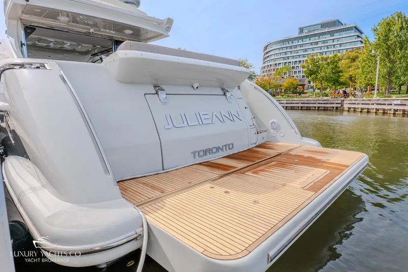  Yacht Photos Pics Azimut 62S yacht, 2010 model, docked in Toronto with spacious teak swim platform.