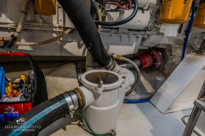  Yacht Photos Pics Engine room of 2010 Azimut 62S yacht with visible hoses and components.