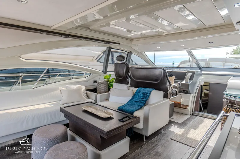  Yacht Photos Pics Luxurious interior of 2010 Azimut 62S yacht with modern seating and elegant decor.