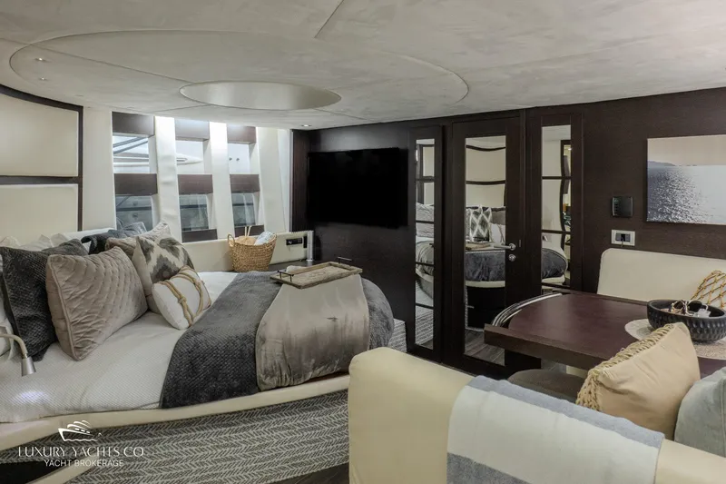  Yacht Photos Pics Luxurious interior of 2010 Azimut 62S yacht with elegant bedroom and modern decor.