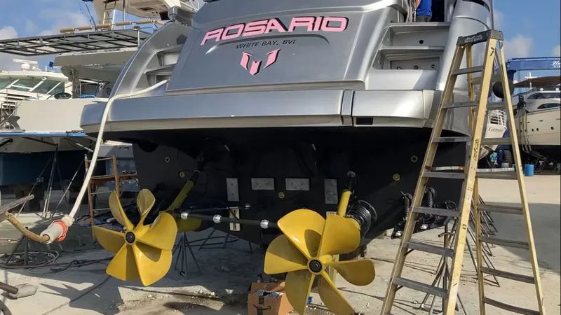 Rosario Yacht Photos Pics 2015 Pershing 70 yacht with yellow propellers in dry dock.