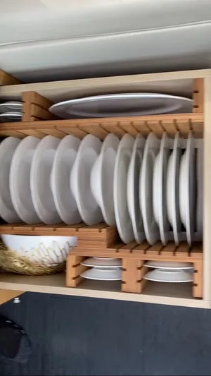 Rosario Yacht Photos Pics Dish storage in a 2015 Pershing 70 yacht.