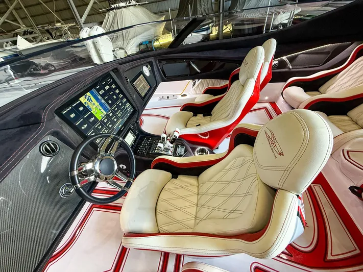  Yacht Photos Pics Luxurious 2019 MTI 48 boat interior with leather seats and advanced navigation system.