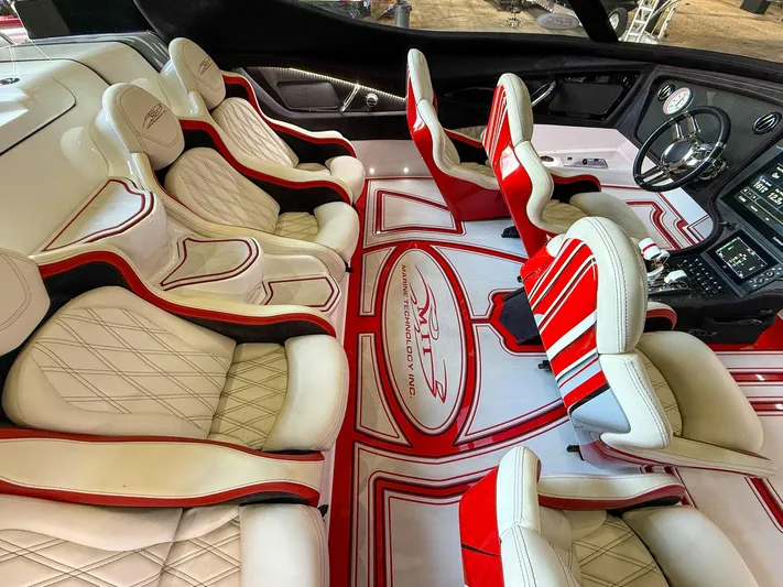  Yacht Photos Pics Luxurious MTI 48 boat interior with red and white seating, 2019 model.