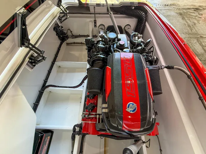 Yacht Photos Pics High-performance engine in 2019 MTI 48 boat, showcasing powerful design and engineering.