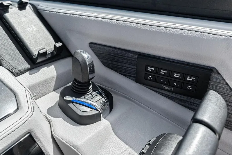 Twin Flame Yacht Photos Pics 2022 Cobalt R8 Outboard control panel with Yamaha joystick and navigation buttons.