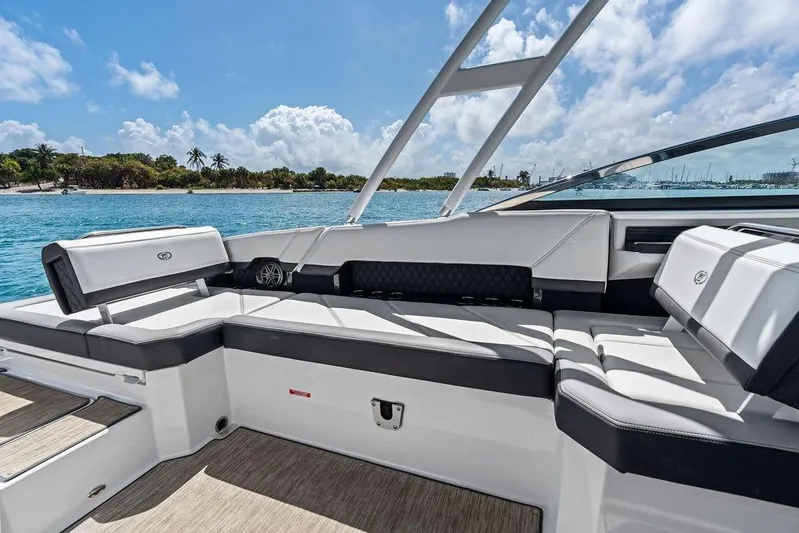 Twin Flame Yacht Photos Pics 2022 Cobalt R8 Outboard boat interior with luxurious seating, ocean view, and clear skies.