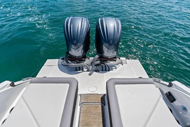 Twin Flame Yacht Photos Pics 2022 Cobalt R8 Outboard boat with dual engines on open water.