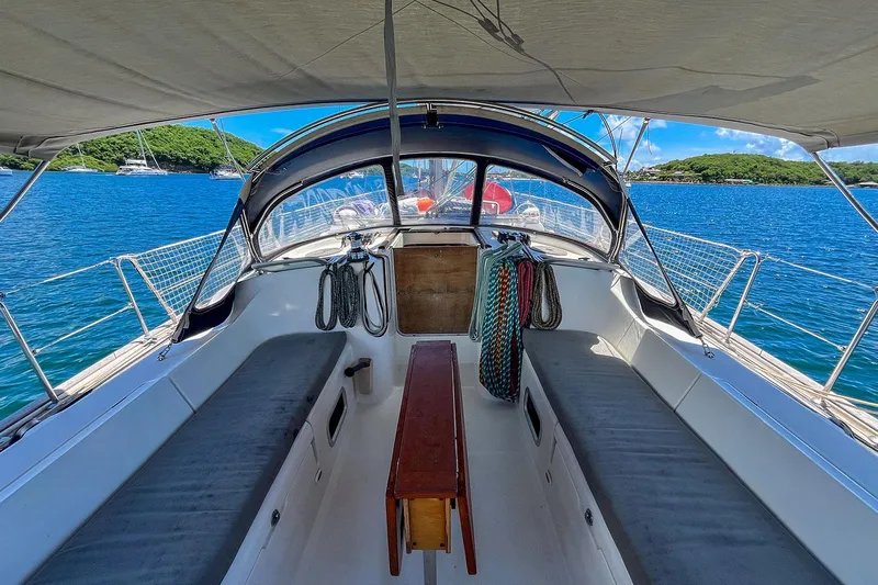  Yacht Photos Pics 2002 Beneteau Oceanis Clipper 473 sailboat cockpit with scenic ocean view.