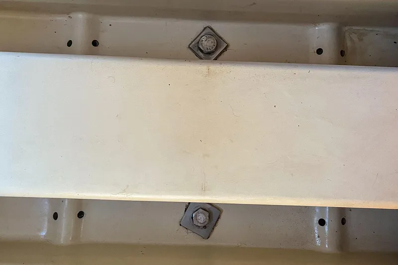  Yacht Photos Pics Structural detail of 2002 Beneteau Oceanis Clipper 473 sailboat, featuring bolts and beams.