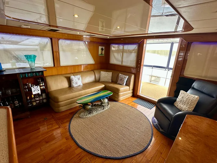 Leslie Jane Yacht Photos Pics Luxurious interior of 2002 Jefferson Marquessa 57 MY yacht with leather seating and elegant decor.