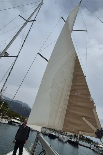  Yacht Photos Pics 2018 Dufour 412 Grand Large sailboat docked with raised sails.