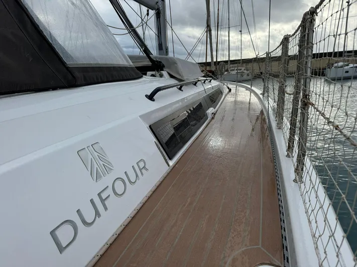 Yacht Photos Pics 2022 Dufour 470 sailboat deck, sleek design, docked in marina.