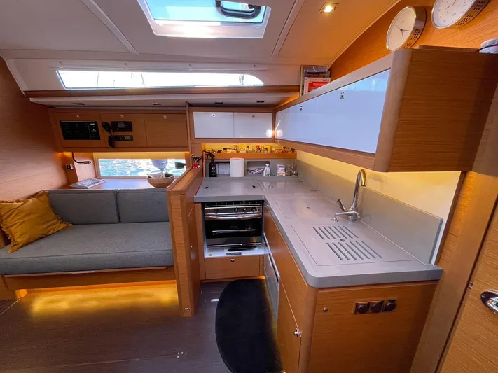  Yacht Photos Pics Modern kitchen interior of 2022 Dufour 470 yacht with sleek design and ample lighting.
