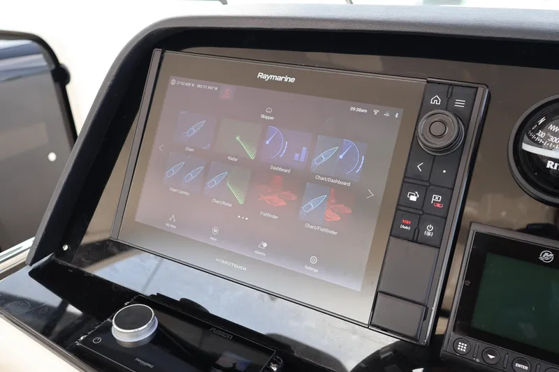  Yacht Photos Pics Touchscreen navigation system on 2023 Aquila 36 Sport boat dashboard.
