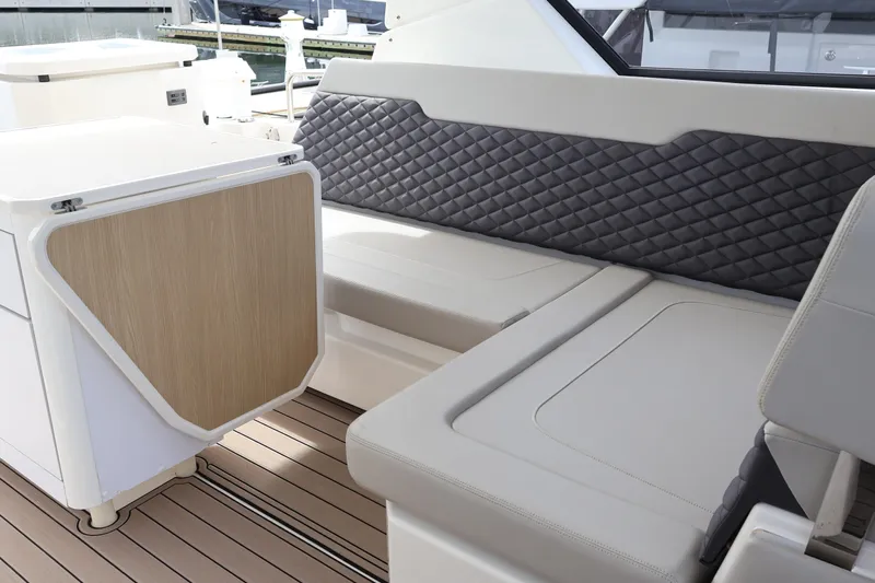 Yacht Photos Pics 2023 Aquila 36 Sport interior with quilted seating and modern design.