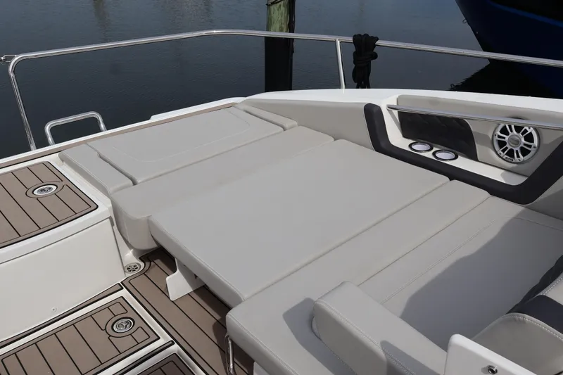  Yacht Photos Pics 2023 Aquila 36 Sport boat with spacious sunbathing deck and modern speaker system.