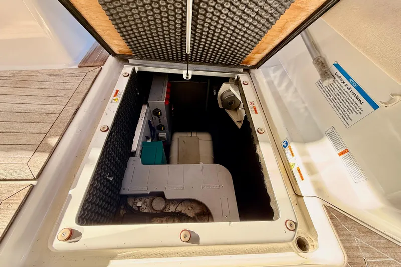  Yacht Photos Pics Engine compartment of 2016 Cranchi M44 HT yacht, showcasing interior components and insulation.