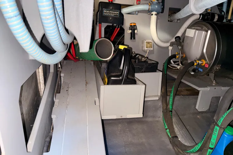  Yacht Photos Pics Engine room of 2016 Cranchi M44 HT yacht with various mechanical components.