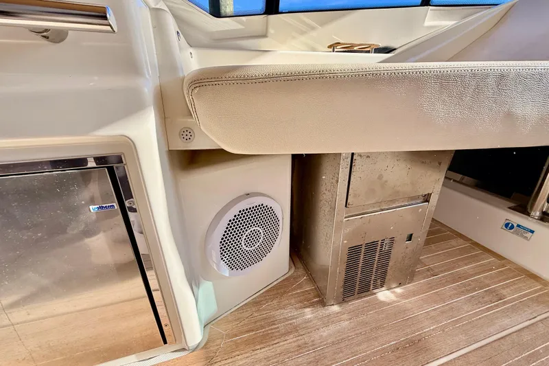  Yacht Photos Pics Interior of 2016 Cranchi M44 HT yacht with speaker and stainless steel appliance.