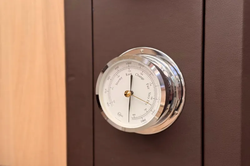  Yacht Photos Pics Barometer on 2016 Cranchi M44 HT yacht interior, indicating weather conditions.