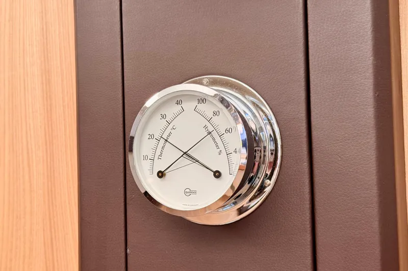  Yacht Photos Pics Thermometer and hygrometer on 2016 Cranchi M44 HT yacht interior panel.