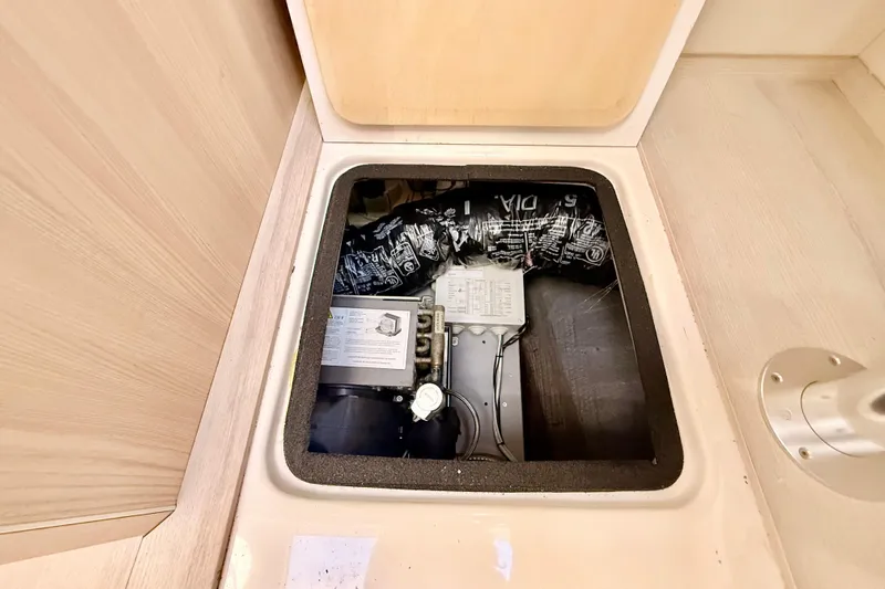  Yacht Photos Pics Engine compartment of 2016 Cranchi M44 HT yacht, showcasing internal components.