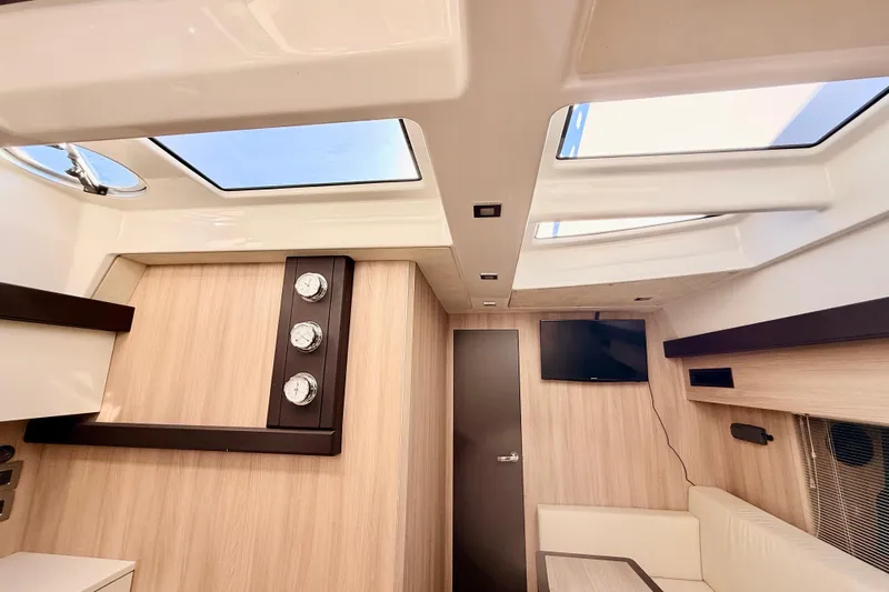 Yacht Photos Pics Luxurious interior of 2016 Cranchi M44 HT yacht with modern design and skylights.